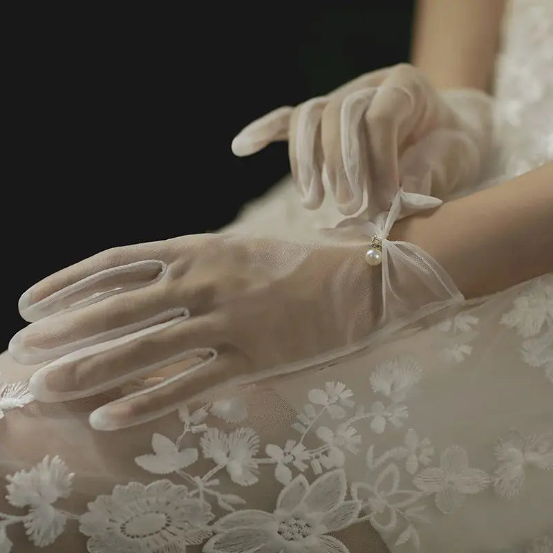 Elegant White Satin Bridal Gloves with Pearl & Bow Detail